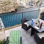 아파트 Seafront Penthouse With Terrace In Xlendi, Gozo *